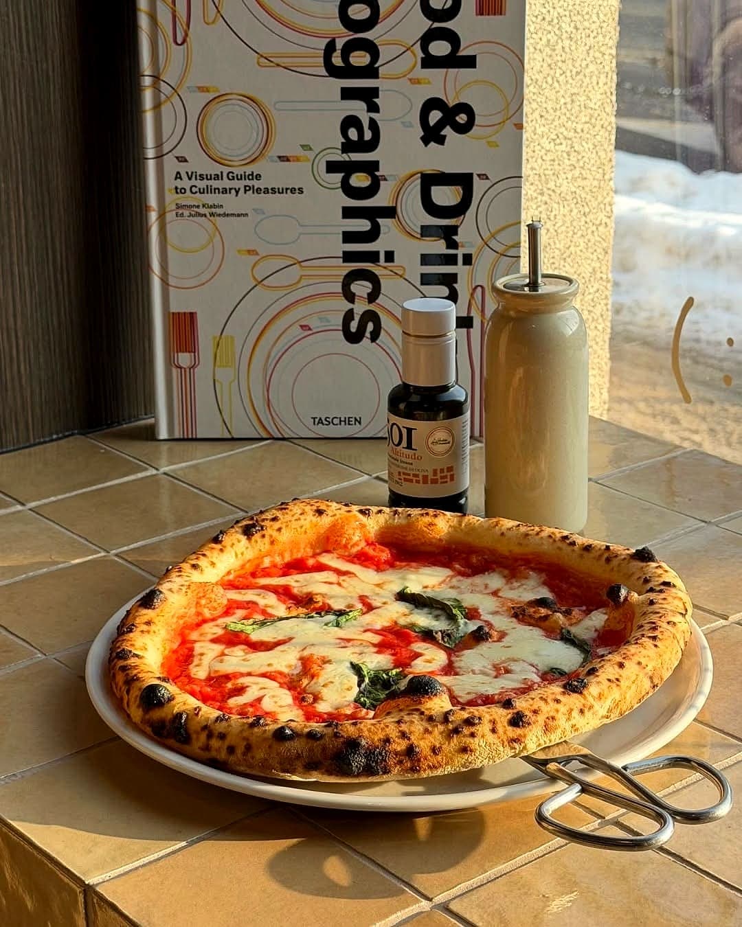 Margherita on a table by the window